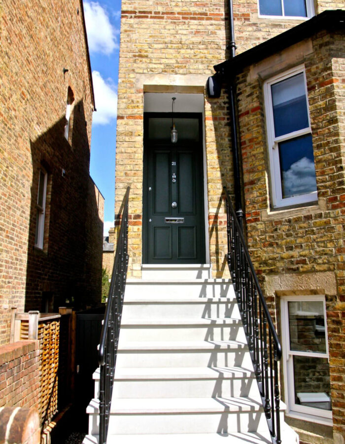 Stone steps and railings up to a Oxford townhouse garden