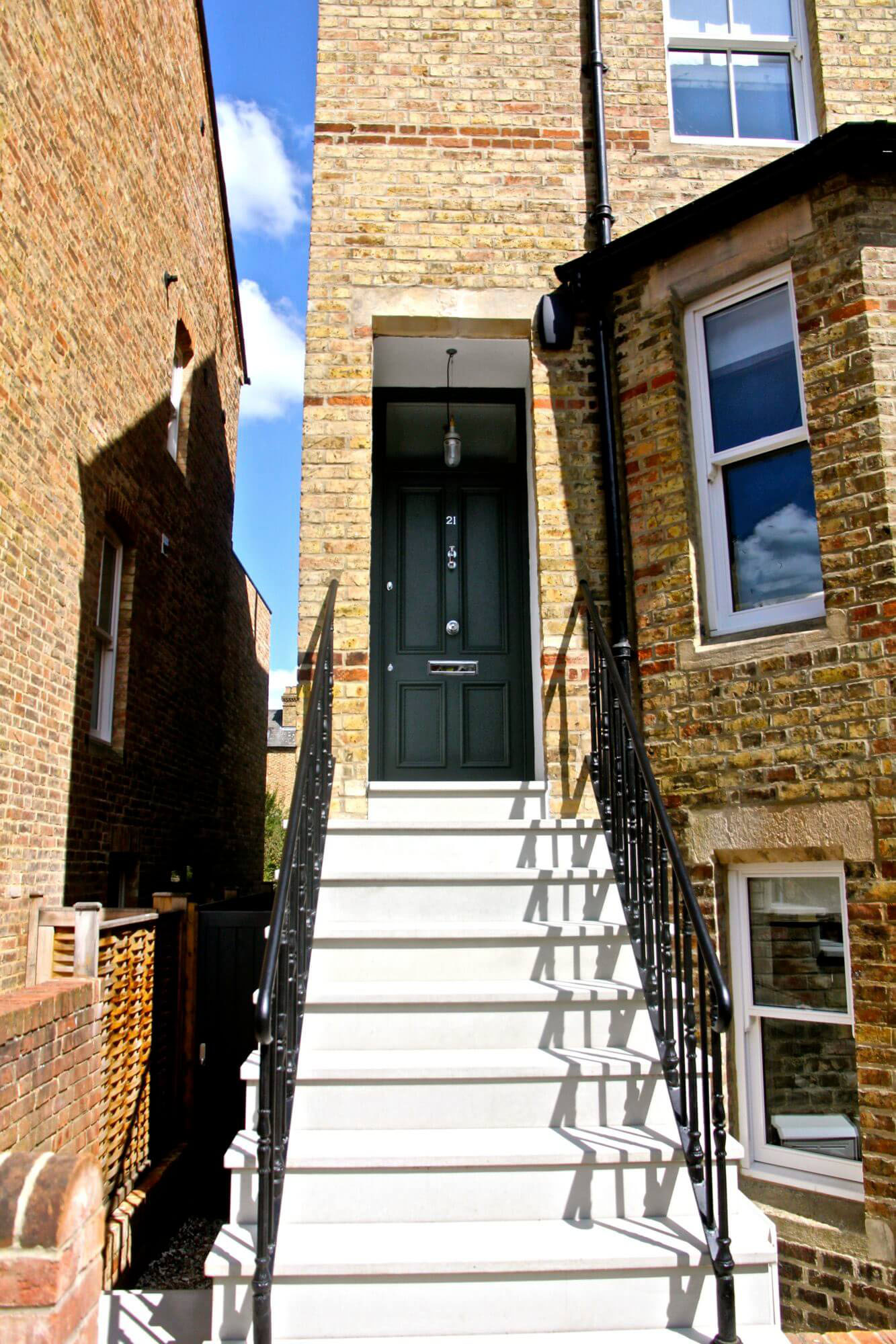 Stone steps and railings up to a Oxford townhouse garden