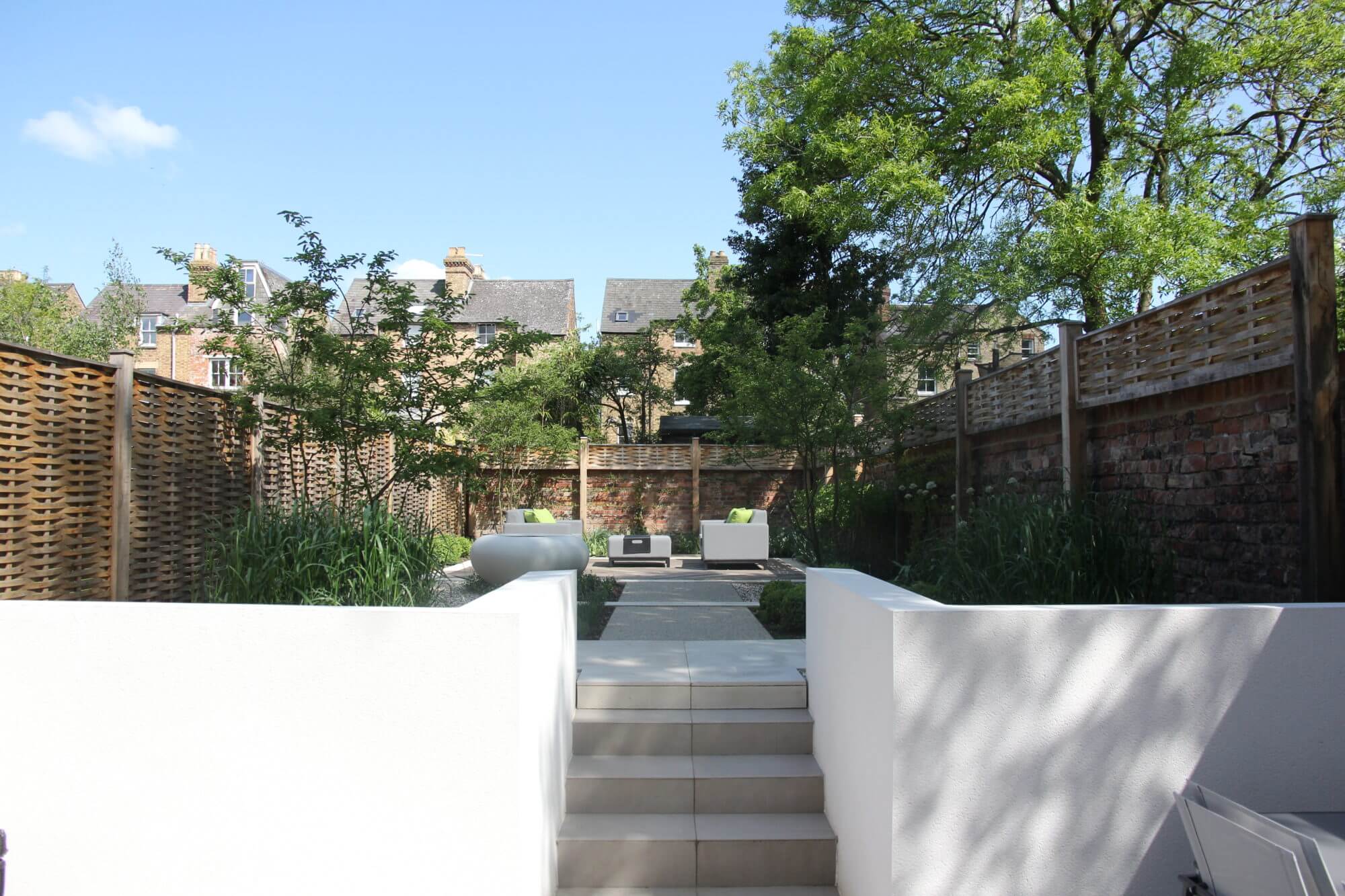 white rendered walls in a townhouse garden