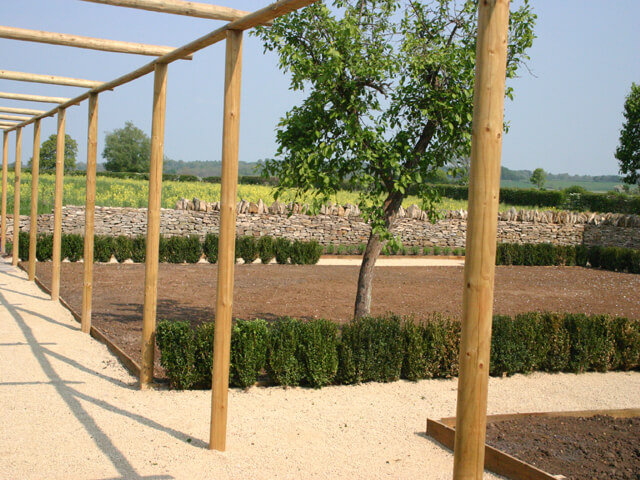 new garden pergola and seeded lawn