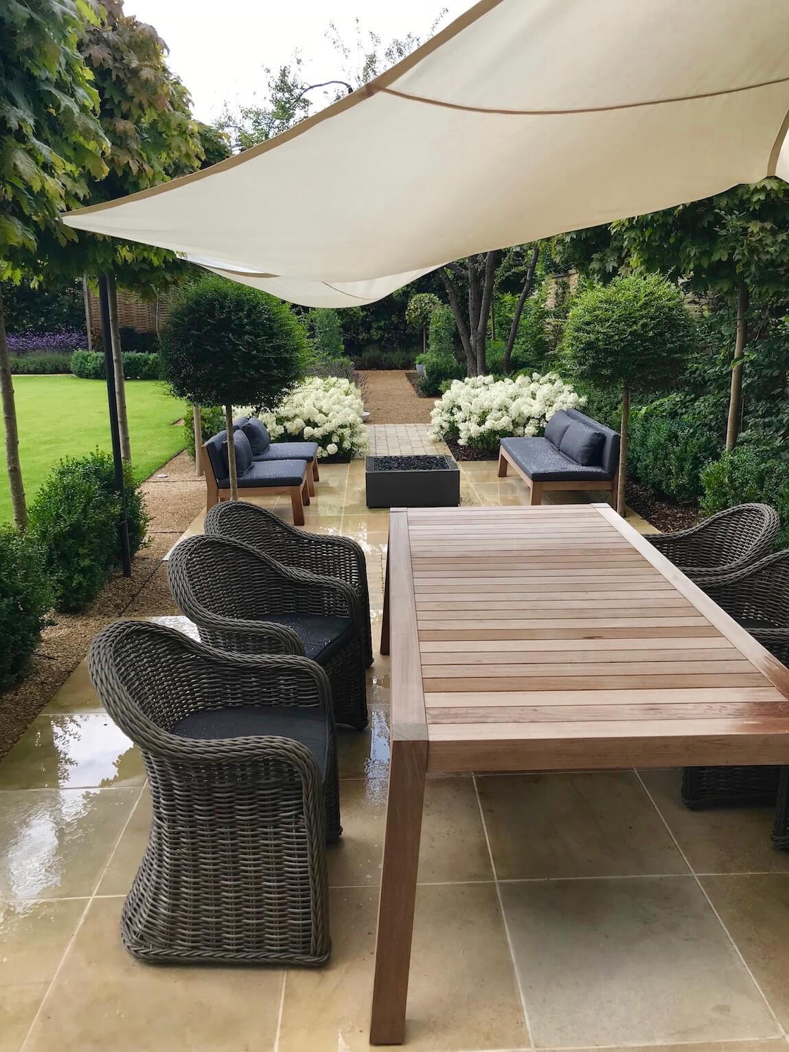 townhouse garden in Oxford shade sail weather protection over dining area