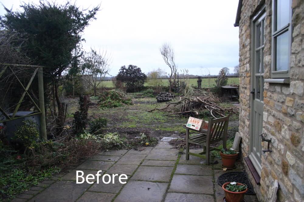 Kingham cottage garden in winter neglected disarray