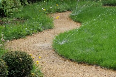 Sprinkler system in use on lawn