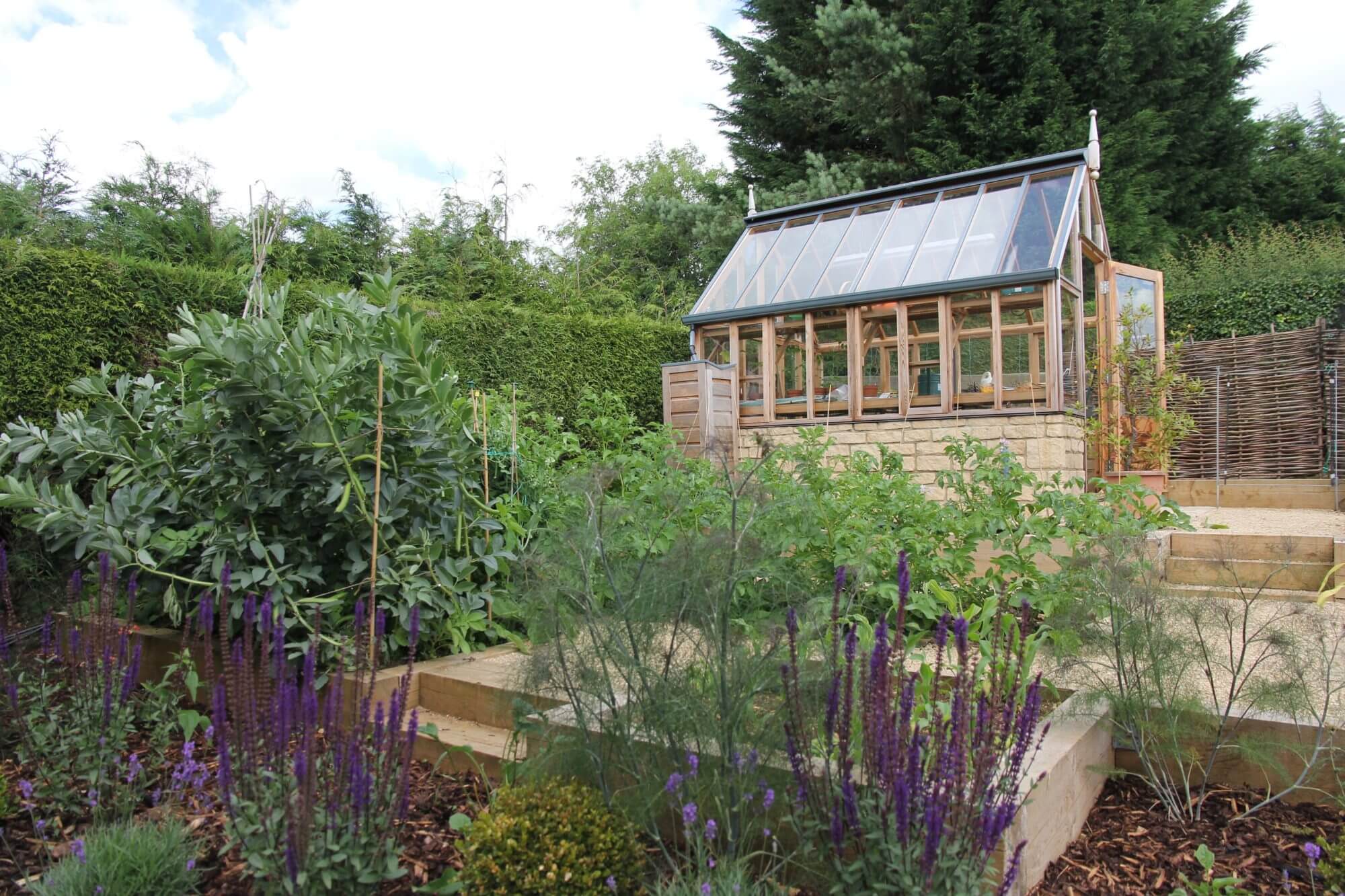 Victorian glass house in productive gardens