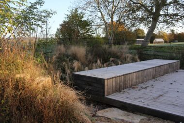 far end poolside natural in autumn with deck