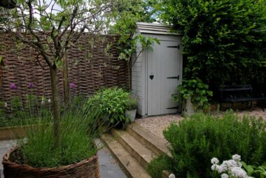 White painted garden shed