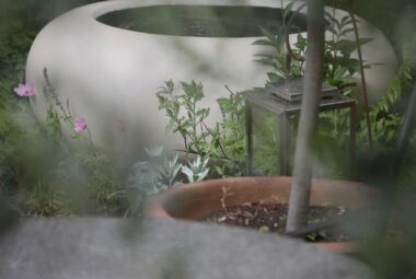 white garden water feature bowl and table