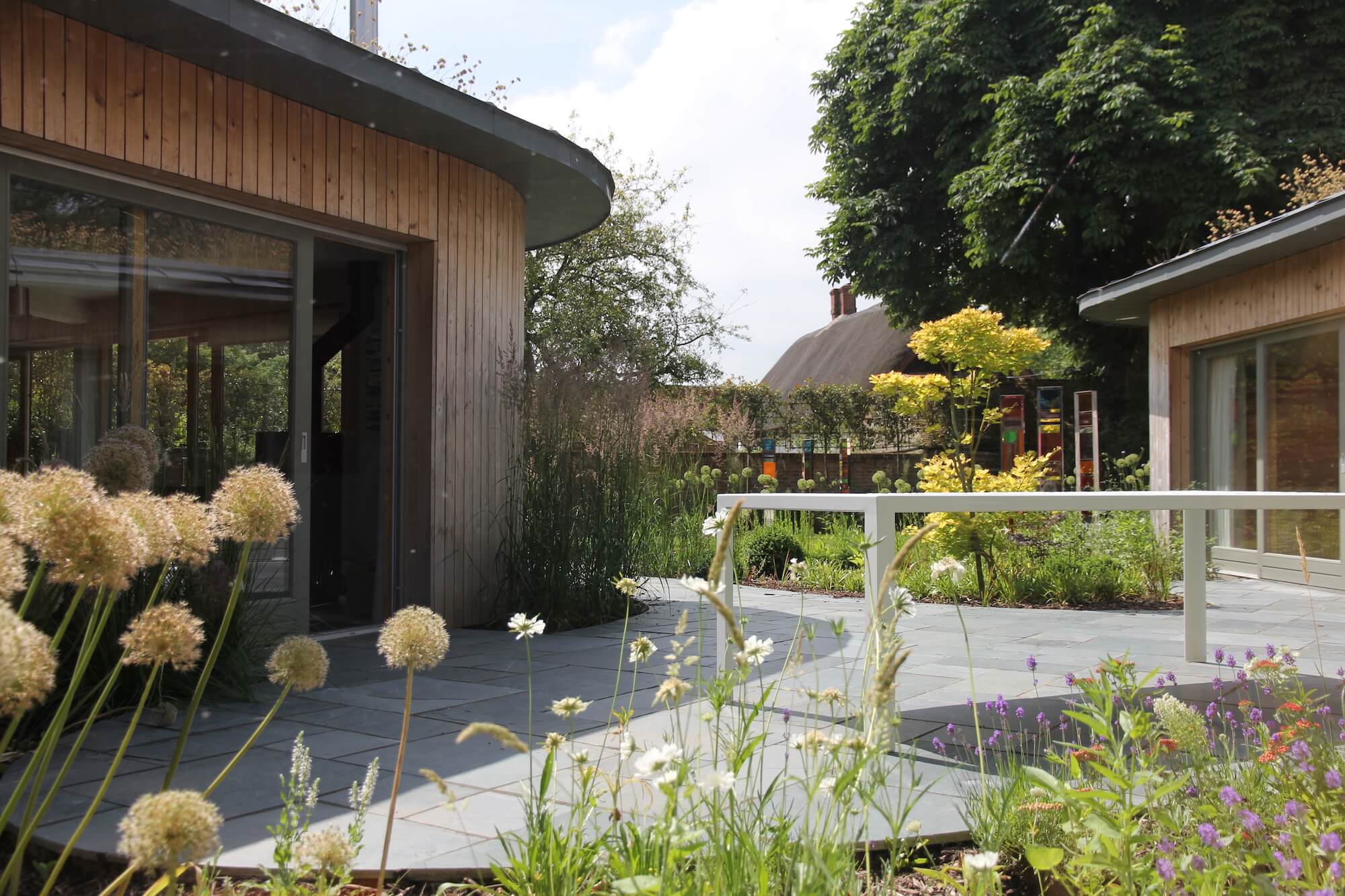 Decking outside wood clad house