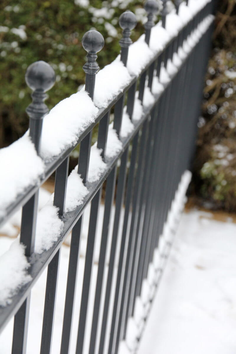 Winter railings in seasonal gardens