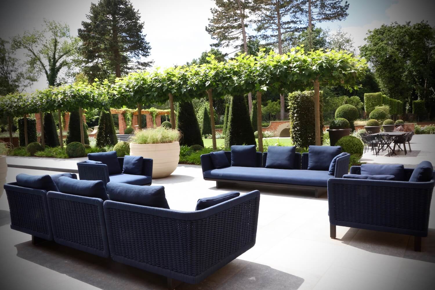 Harpsden Wood House poolside navy garden furniture