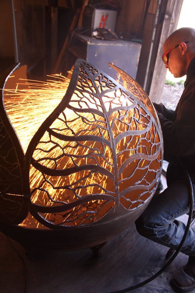 a fire feature sculpture being welded