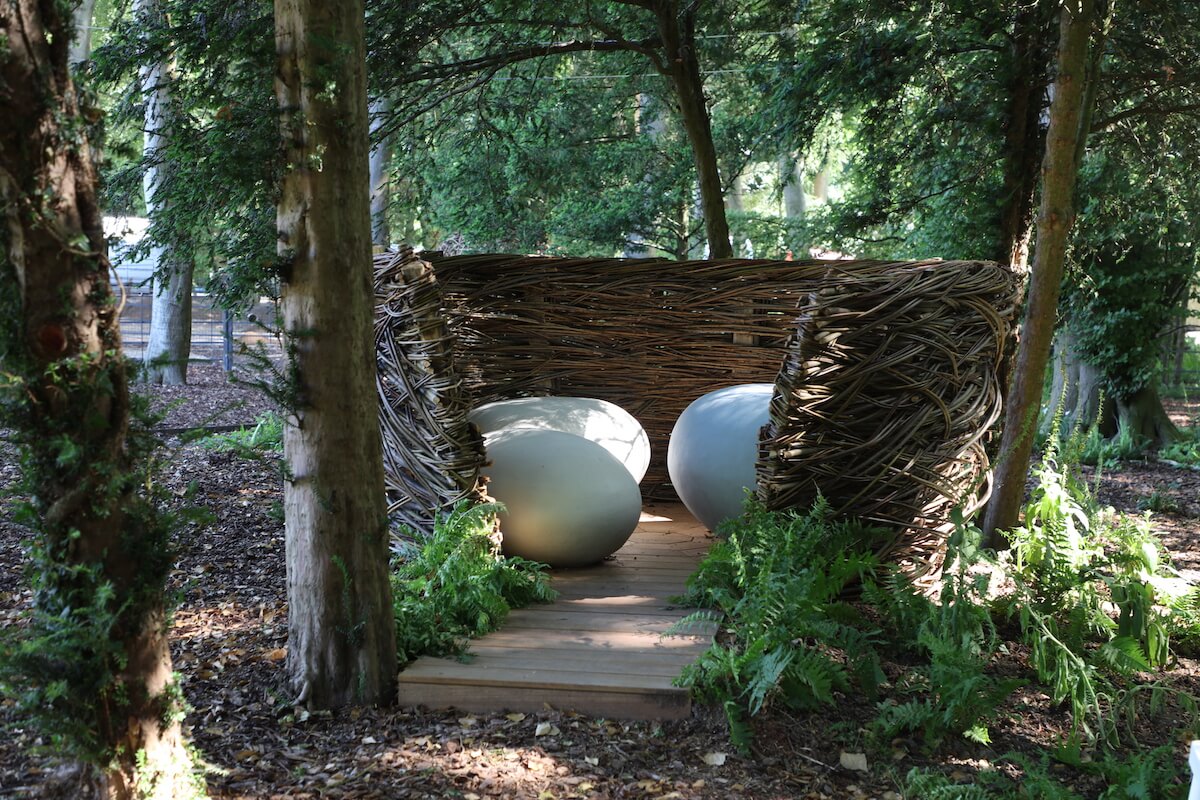 Harpsden Wood House in Henley-on-Thames grounds and gardens estate garden sculpture nest and eggs in woods like land art