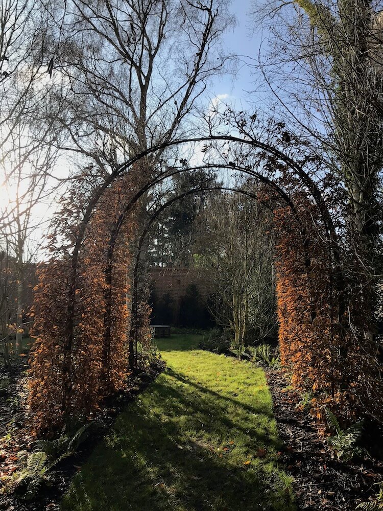 autumn Harpsden Wood House in Henley-on-Thames with green grounds and gardens designed by Hendy Curzon Gardens