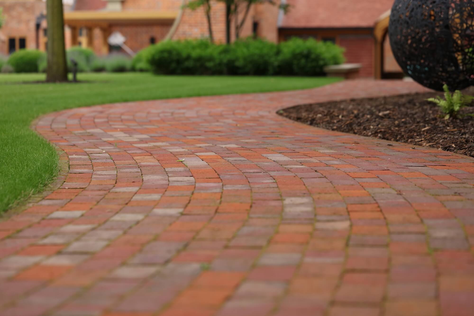 red brick pathway serpentine shape