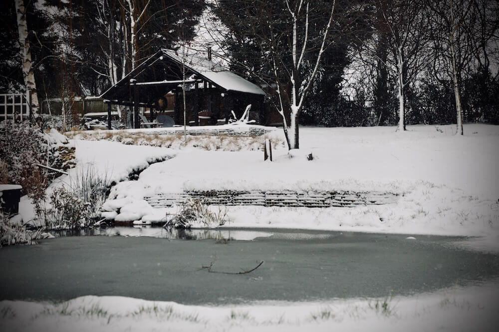 riverside black shack in the Cotswolds