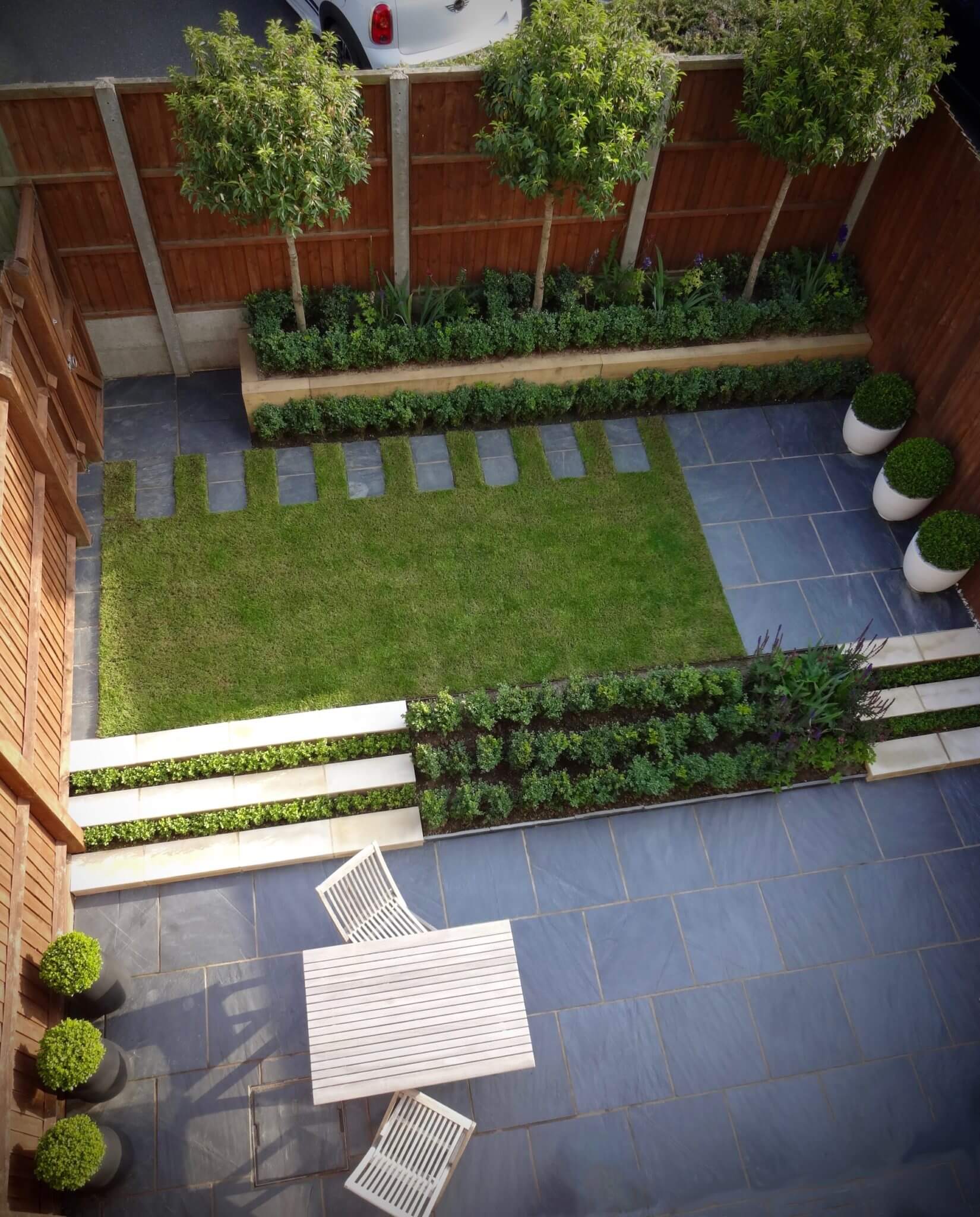 small modern courtyard garden in slate