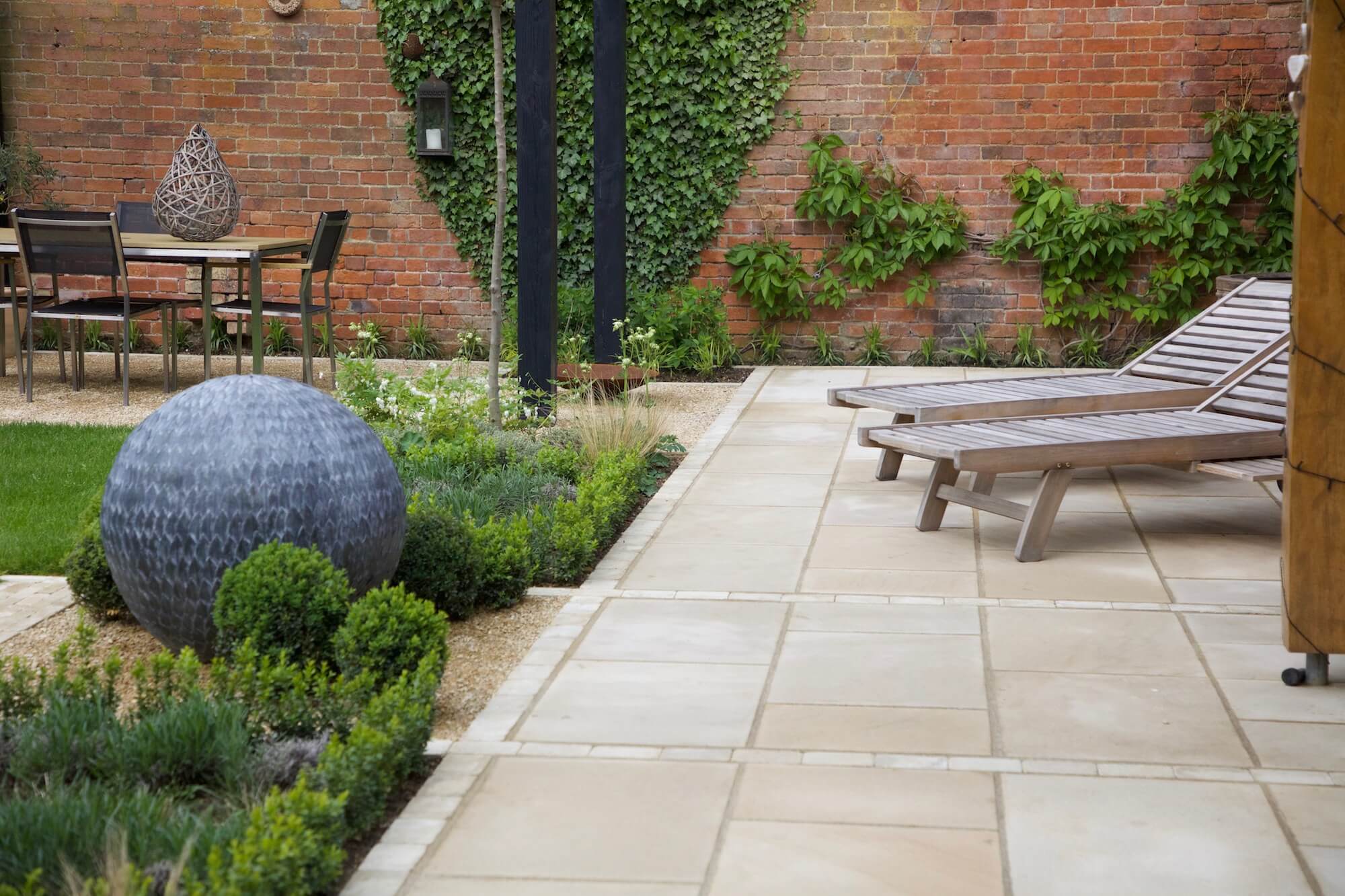 walled garden with limestone patio