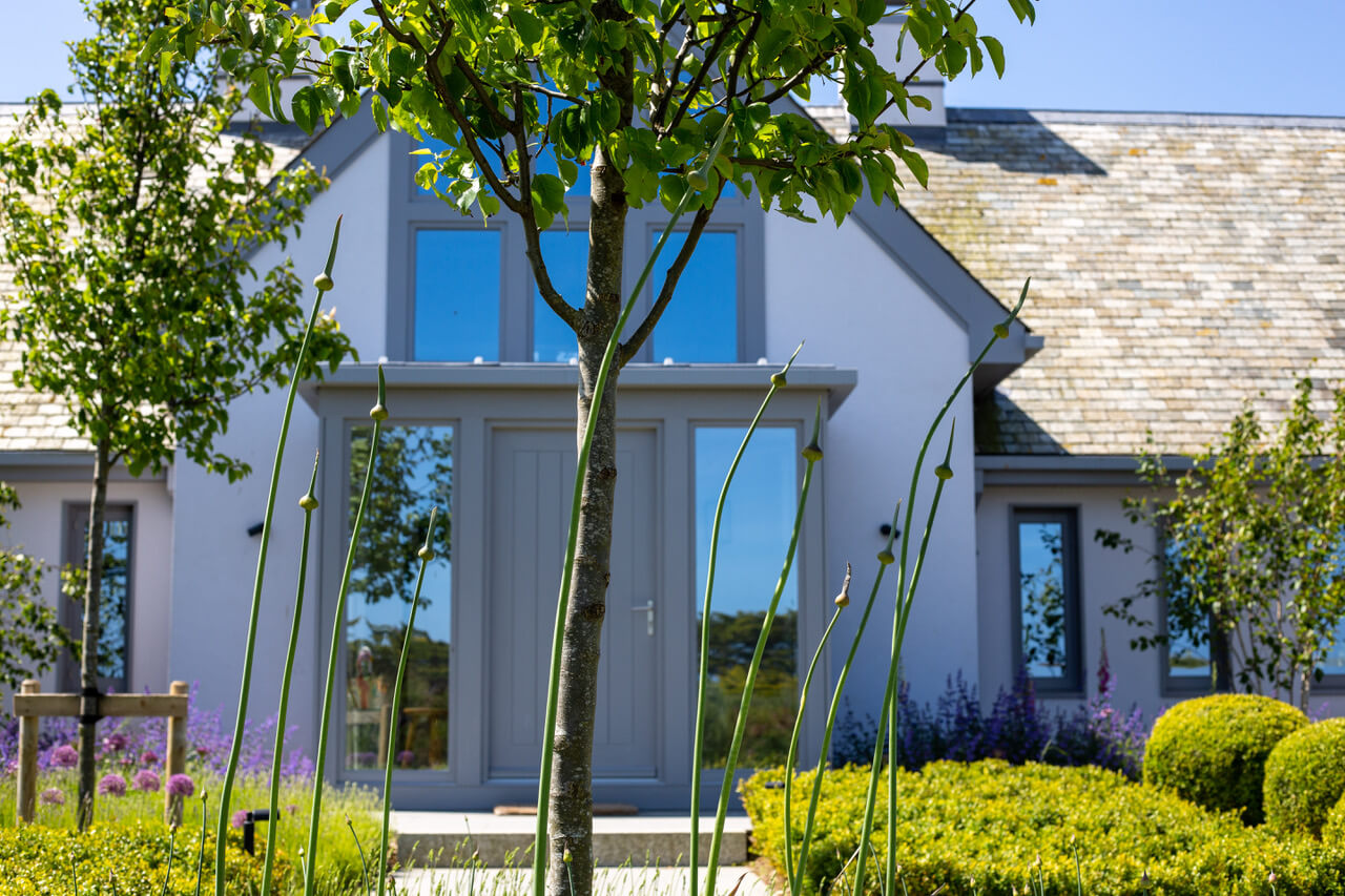 cornwall house and garden architecture design with blue skies