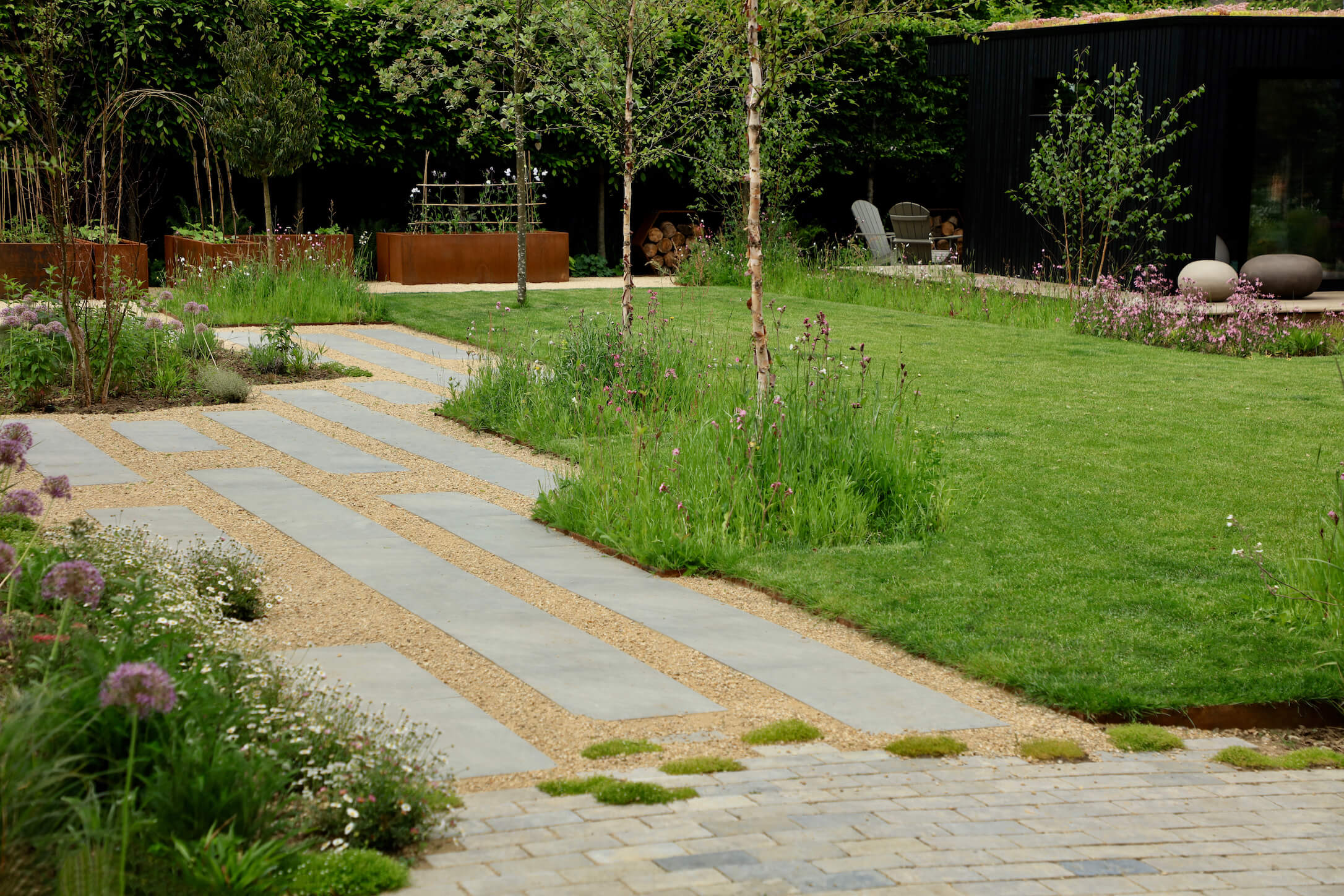 Pathway through landscaped townhouse garden