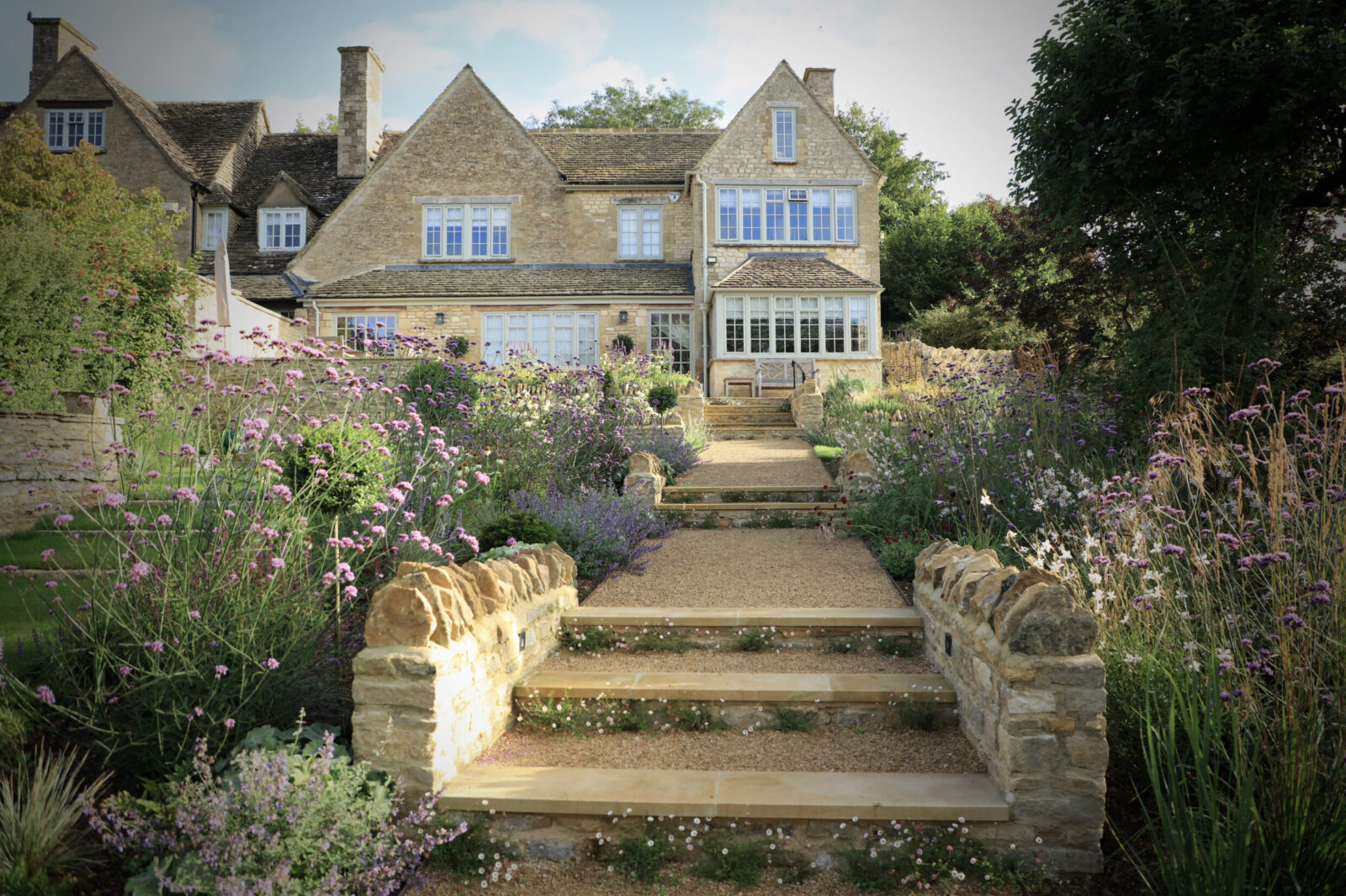 The view of the back of the house as you go up hoggin steps