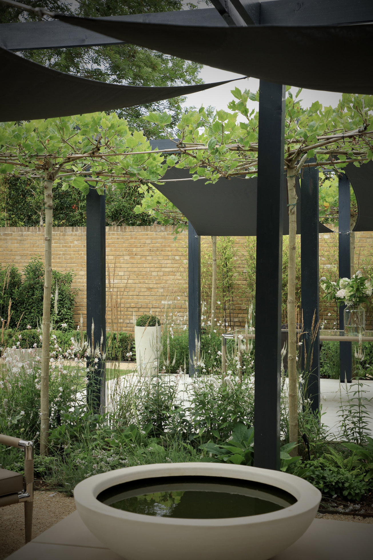 Waterbowl under sunshade in Sundae garden oxford townhouse 