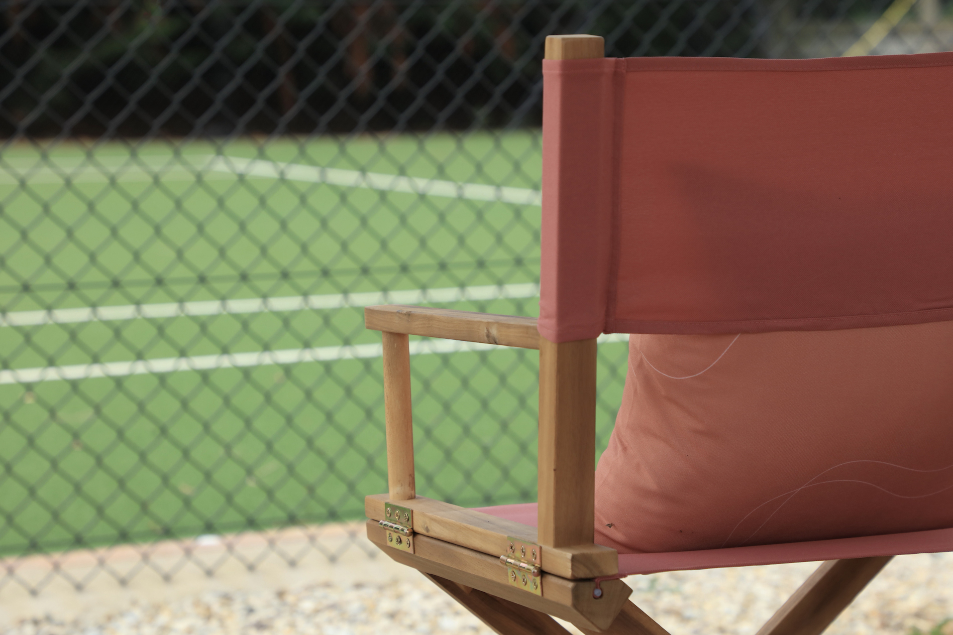 Terracotta director chairs at sibford park tennis pavilion 
