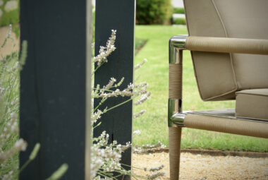 Indian ocean furniture beneath the arbor of Oxford townhouse garden