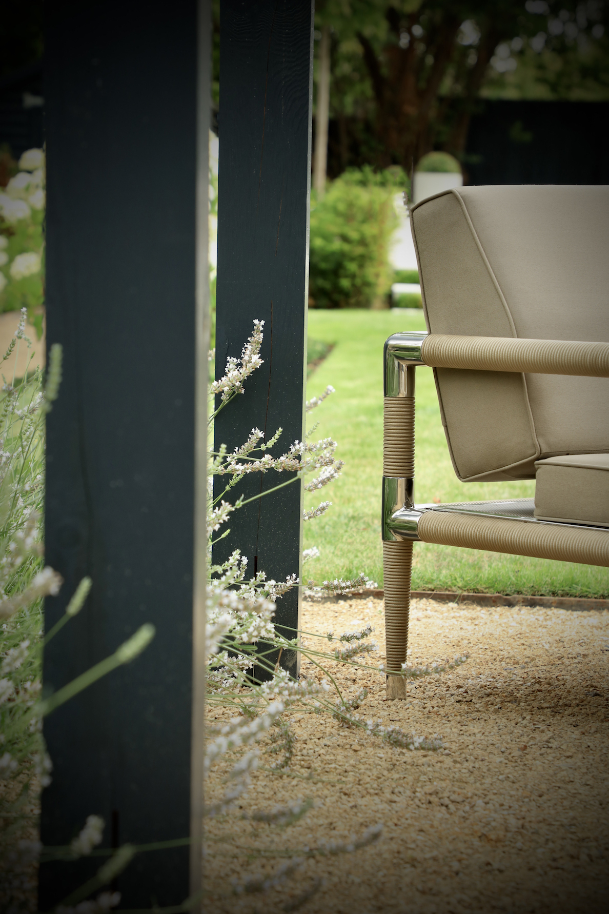 Indian ocean furniture beneath the arbor of Oxford townhouse garden