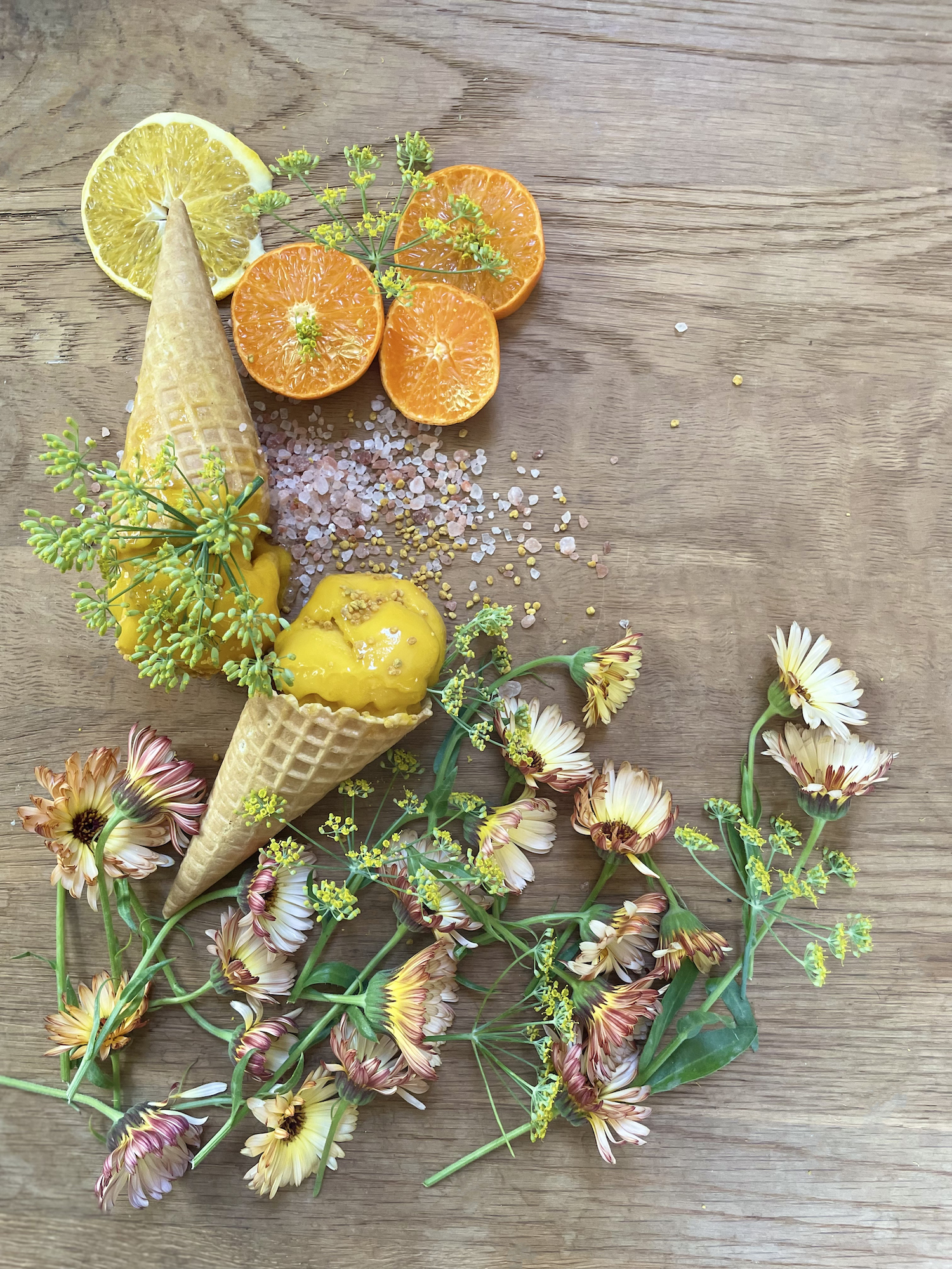 Orange sorbet with tagetes and fennel and pink Himalayan salt