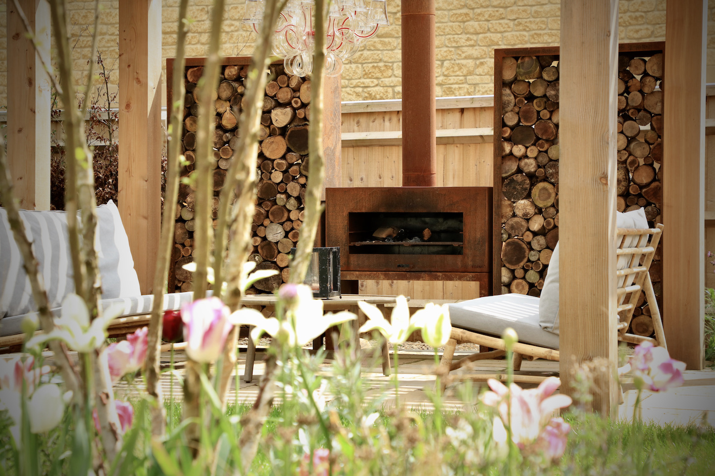 Corten log store under arbour by hc gardens