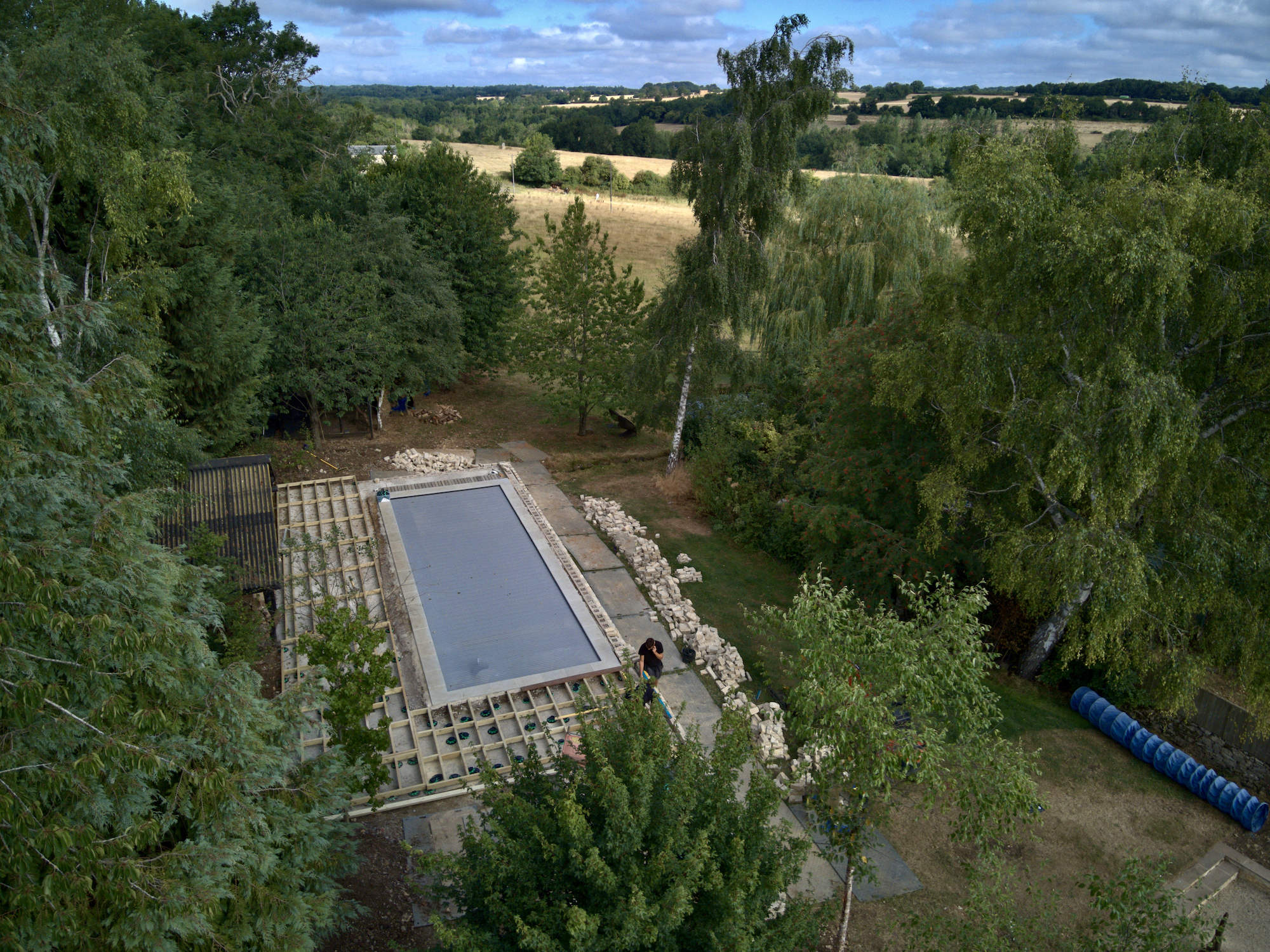 Ariel shot from above the trees in Oxfordshire countryside 