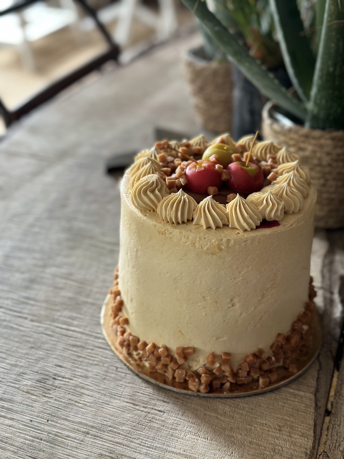 Toffee apple cake on Halloween with sugared crab apples