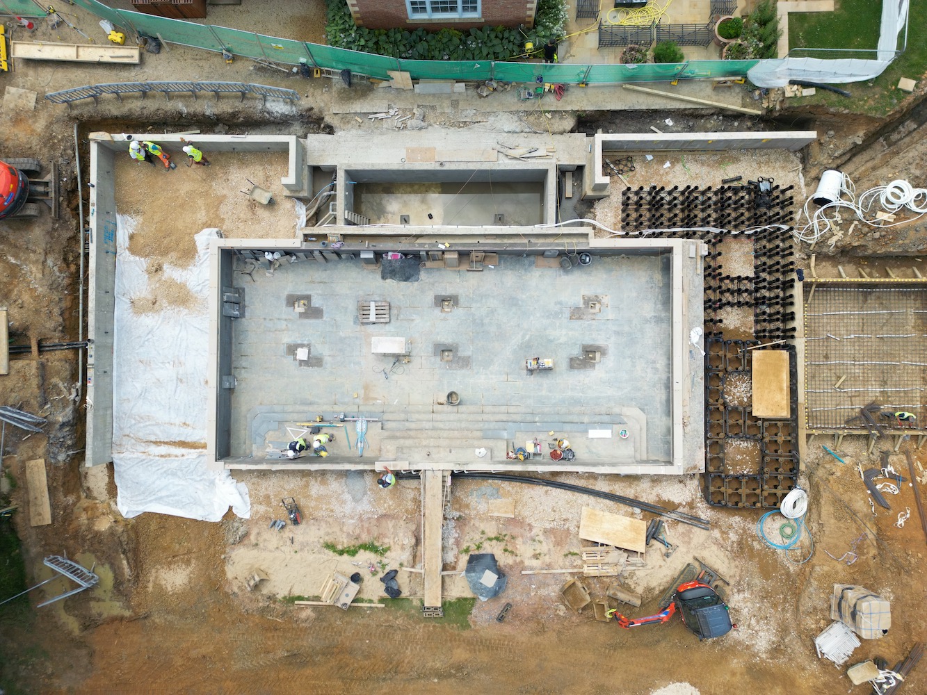 Aerial drone shot of Sibford Park swimming pool under construction