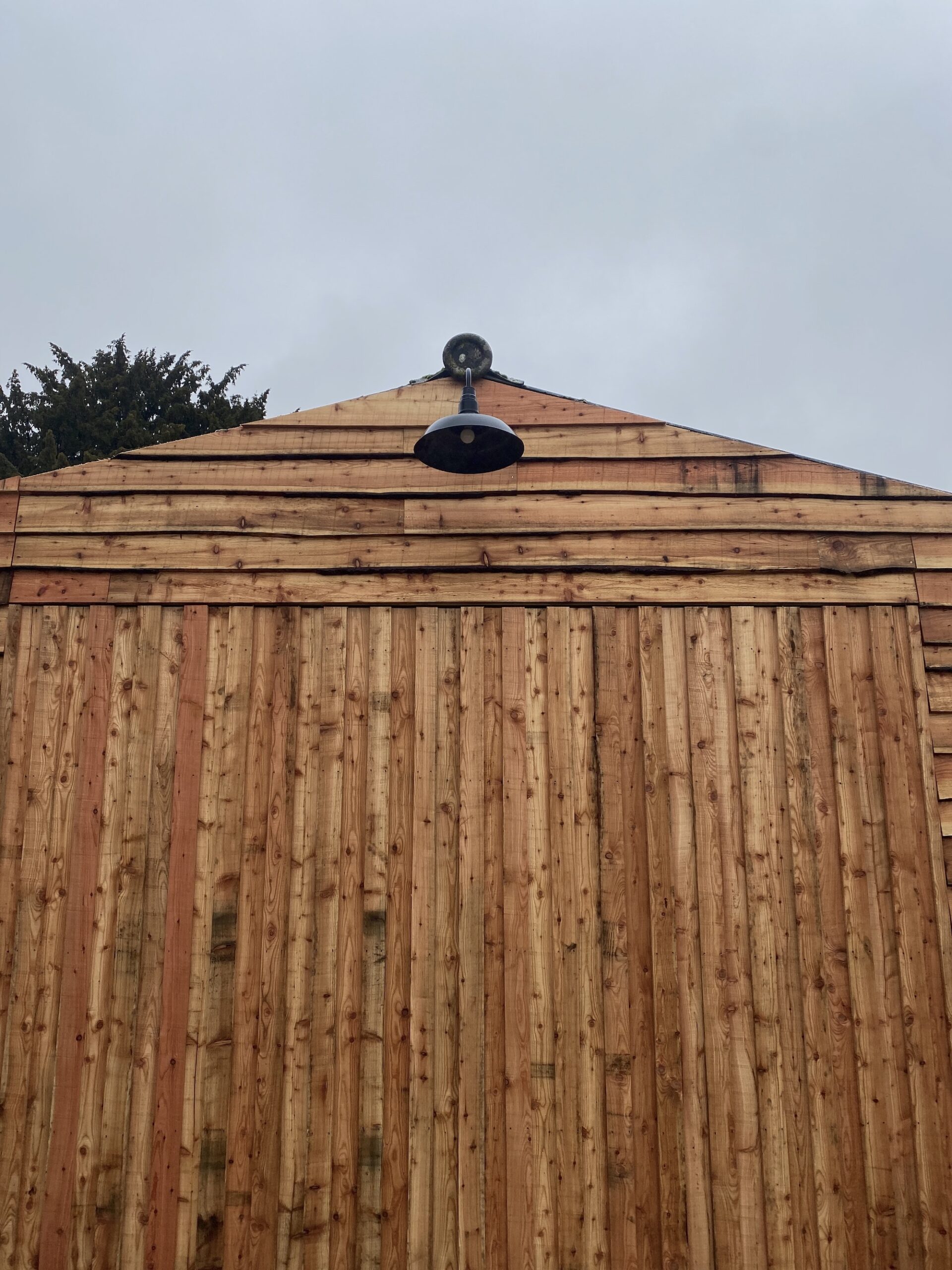 Cladded barn at Woodstock Studio with Restoration hardware outdoor light