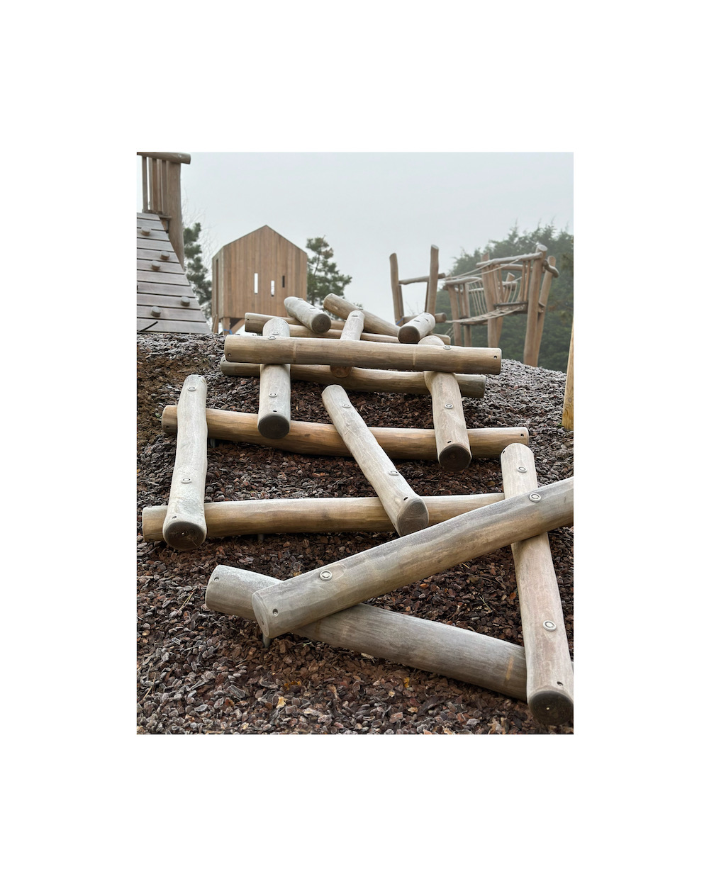Frosty morning log scramble play equipment in Cotswold Playscape designed and installed by HC 