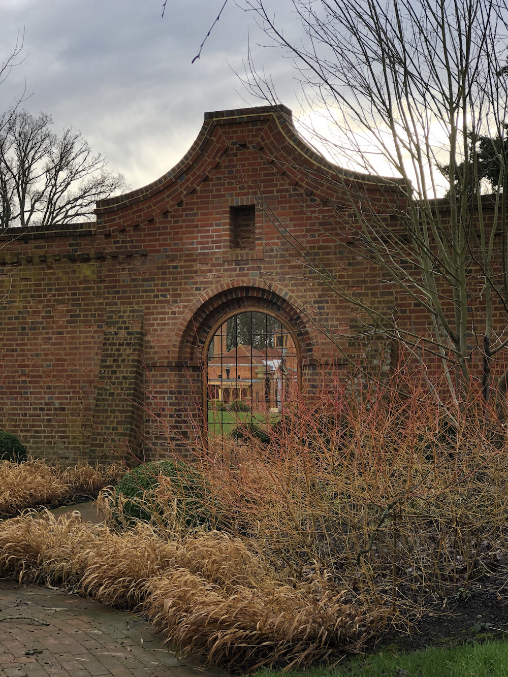 Harpsden wood House exterior in Autumn with fiery orange 